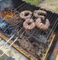 Grilled sausages on the grill