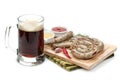 Grilled sausages with ketchup, mustard and mug of beer Royalty Free Stock Photo