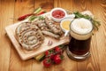 Grilled sausages with mug of beer Royalty Free Stock Photo