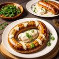 Grilled sausages with mustard and parsley on a white plate. Royalty Free Stock Photo