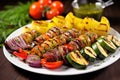 grilled sausages with mustard and grilled vegetables on plate Royalty Free Stock Photo