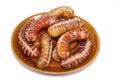 Grilled sausages on a plate Royalty Free Stock Photo
