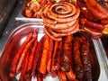 Grilled sausages and pork roasts Royalty Free Stock Photo