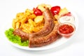 Grilled sausages with potatoes fries solated on white background Royalty Free Stock Photo