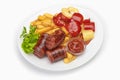 Grilled sausages with potatoes fries and sweet bulgarian peppers and red sauce ketchup Royalty Free Stock Photo