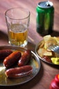 Grilled sausages prepared on grill Royalty Free Stock Photo