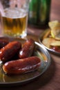 Grilled sausages prepared on grill Royalty Free Stock Photo