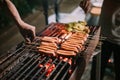 Grilled sausages skewered on skewers are prepared to be grilled on a grill Royalty Free Stock Photo