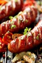 Grilled sausages and vegetables with addition spices and fresh herbs on a grill Royalty Free Stock Photo