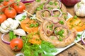 Grilled sausages and vegetables close-up. horizontal photo. Royalty Free Stock Photo