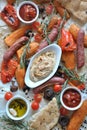 Grilled sausages and vegetables platter served with humus and pita bread, Royalty Free Stock Photo