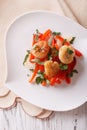 Grilled Scallops with peppers and herbs closeup. Vertical top vi Royalty Free Stock Photo