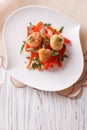 Grilled Scallops with peppers and herbs. Vertical top view Royalty Free Stock Photo