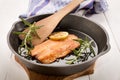 Grilled scottish kipper in a cast iron pan