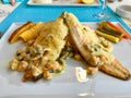 Grilled Sea Bass Fish Food with Mussels and Sauce served at Fish Restaurant / Levrek. Royalty Free Stock Photo