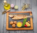 Grilled sea bass fish with potatoes and vegetables Royalty Free Stock Photo
