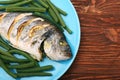 Grilled sea bream fish with green beans