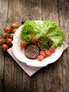 Grilled seitan with tomatoes Royalty Free Stock Photo