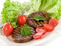 Grilled seitan with tomatoes Royalty Free Stock Photo