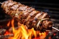 grilled shawarma meat rotating on a vertical spit Royalty Free Stock Photo