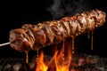 grilled shawarma meat rotating on a vertical spit Royalty Free Stock Photo
