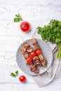 Grilled shish kebab skewers with tomatoes Royalty Free Stock Photo