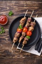 Grilled shish kebab skewers  with tomatoes Royalty Free Stock Photo