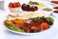Grilled shish kebab with tomatoes on the skewers Royalty Free Stock Photo