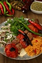 Grilled shish kebab with tomatoes on the skewers Royalty Free Stock Photo