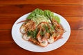 Grilled shrimp and cut in half with vegetables and cabbage in white dish. Royalty Free Stock Photo