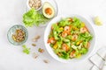 Grilled shrimp salad with avocado, mango, lettuce and pistachios, dressed with lime. Healthy food. Ketogenic diet. Top view Royalty Free Stock Photo