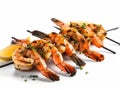 Grilled shrimp on skewers with lemon wedges