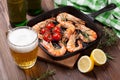 Grilled shrimps and beer Royalty Free Stock Photo