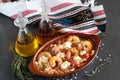 Grilled shrimps covered with feta cheese, tomatosauce