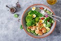 Grilled shrimps and fresh vegetable salad, egg and broccoli. Grilled prawns. Royalty Free Stock Photo
