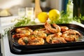 Grilled shrimps on kitchen table in light interior