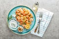 Grilled shrimps or prawns served with lemon, garlic and sauce Royalty Free Stock Photo
