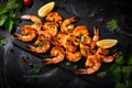 Grilled shrimps with seasoning on dark background