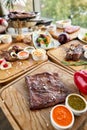 Grilled Skirt Steak. Barbecue restaurant menu. Many different food on the table. Dinner party or Banquet. Royalty Free Stock Photo
