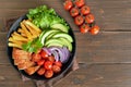 Grilled sliced pork steak, french fries and fresh vegetables on plate Royalty Free Stock Photo