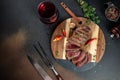 Grilled sliced skirt beef meat steak on a dark background. top view. copy space for text Royalty Free Stock Photo