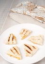 Grilled small cheese quesadilla pieces Royalty Free Stock Photo