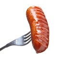 Grilled sausage on a fork Royalty Free Stock Photo