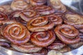 Grilled smoked sausages and meatballs outdoors. Meat baked on the grill bbq. Meat delicacies. Sausages homemade sausages on the Royalty Free Stock Photo