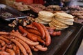 Grilled sousage, different tipe of meat and pita bread.