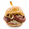 Grilled spicy bratwurst burger on a sesame bun Royalty Free Stock Photo