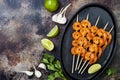 Grilled spicy lime shrimp skewers with creamy avocado garlic cilantro sauce. Top view, overhead, flat lay, copy space. Royalty Free Stock Photo