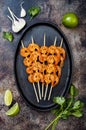 Grilled spicy lime shrimp skewers. Top view, overhead, flat lay. Royalty Free Stock Photo