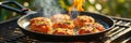Grilled spicy rice balls cooking outdoors on a skillet over open flame Royalty Free Stock Photo