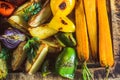 Grilled spring vegetables on a wooden board.